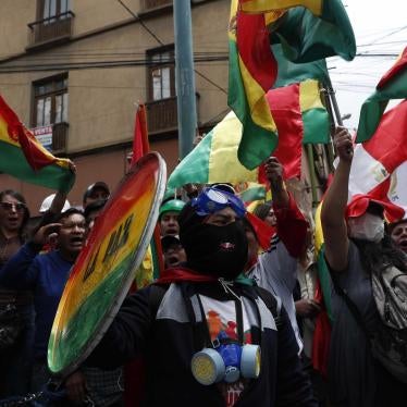 Anti-government protesters against the reelection of President Evo Morales gather just meters away from the presidential palace in La Paz, Bolivia, on Saturday, November 9, 2019.