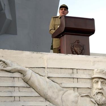 Raúl Castro speaks at a rally in Camagüey, Cuba, in July 2007, a year after being handed power by his ailing brother, Fidel Castro (depicted in the bas-relief in the foreground).