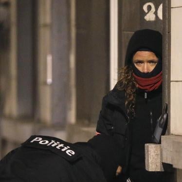 Belgian federal police search the Schaerbeek district of Brussels following the March 22, 2016 bombings in the city. 