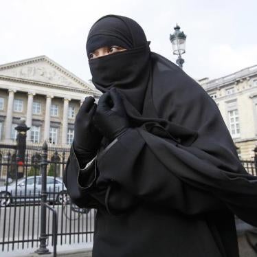 Salma, a 22-year-old French national living in Belgium who chooses to wear the niqab after converting to Islam, gives an interview to Reuters television outside the Belgian Parliament in Brussels in this April 26, 2010 file photo.