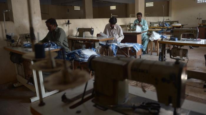 Garment workers making shirts at a factory in Karachi, Pakistan, February 2015. 