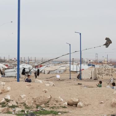 Children fly a kite at al-Hol camp in northeast Syria. 