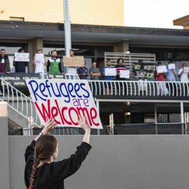 Asylum seekers and human rights activists protest against the detention of refugees amid the Covid-19 crisis in Brisbane.