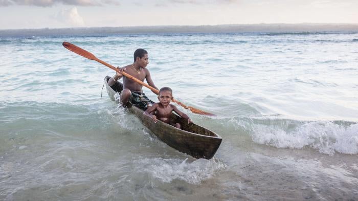 Two boys in a canoe