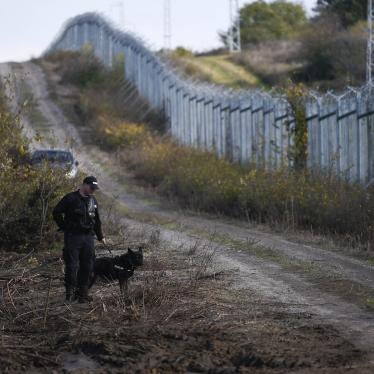 Bulgarian police patrol the border fence on the Bulgaria-Turkey border near the village of Matochina on November 4, 2021. © 2021 Nikolay Doychinov/AFP via Getty Images