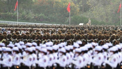 Officers march during a parade