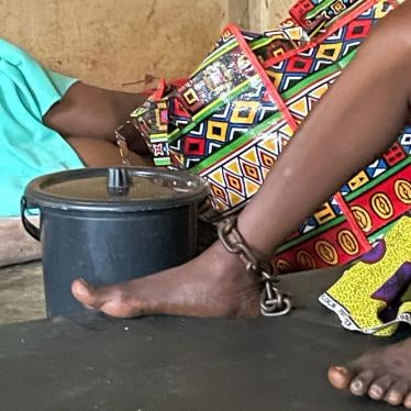 A woman with a real or perceived psychosocial disability is chained in a room at Mount Horeb Prayer Camp in Ghana.