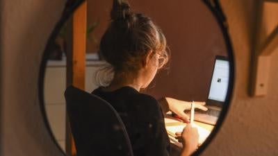 A girl studies online at home during Covid-19 school closures in Berlin.