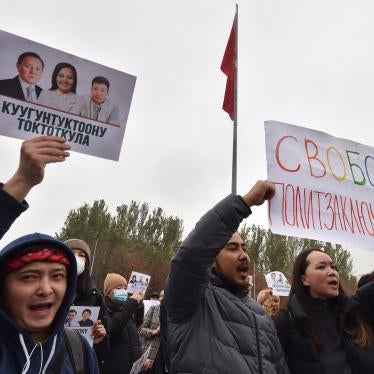 Demonstrators protest against a controversial border demarcation deal… and demand to free detained opposition politicians and activists, in Bishkek on October 24, 2022 