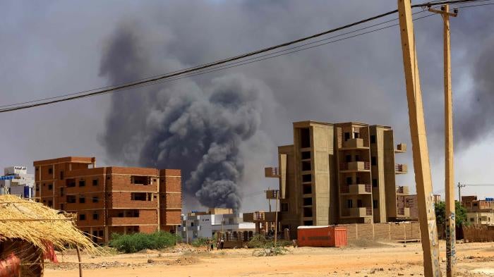 Smoke rises above buildings after an aerial bombing during fighting between the army and the Rapid Support Forces in Khartoum North, Sudan, May 1, 2023.