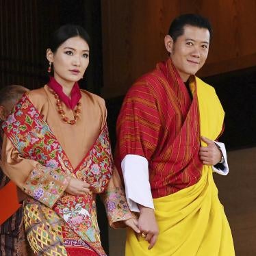 The king of Bhutan, Jigme Khesar Namgyel Wangchuck, and his wife attend the enthronement ceremony at the Imperial Palace in Tokyo.