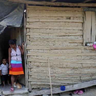 A woman and her son at their home in the community of El Redondo, municipality of Trojes, Honduras, April 28, 2021.