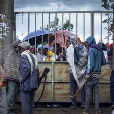 Displaced Ethiopians from different towns in the Amhara region wait for aid distributions at a center for the internally-displaced in Debark, in the Amhara region of northern Ethiopia August 26, 2021. 