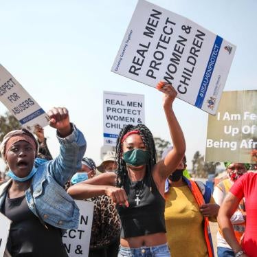 Community members protest against gender-based violence in Vlakfontein, South Africa, August 25, 2021. 