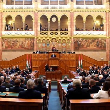 Hungarian Prime Minister Viktor Orban, center, delivers his address on the opening day of the parliament's autumn session 