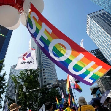 A rainbow banner is held aloft during the Seoul Queer Culture Festival in Seoul, South Korea, July 1, 2023.