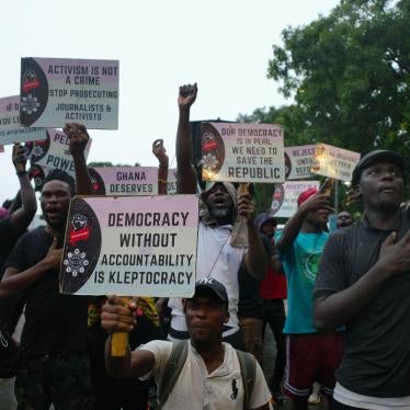 Protesters hold placards during a demonstration in Accra, Ghana against deteriorating economic conditions and fund mismanagement  in the country, on September 22, 2023. (c) 2023  NIPAH DENNIS/AFP via Getty Images