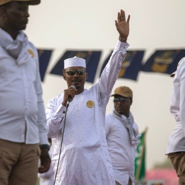 Deby waiving at the crowd