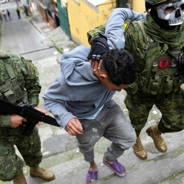 Soldiers briefly detain a youth to walk him to an area to check if he has gang-related tattoos as they patrol the south side of Quito, Ecuador, Friday January 12, 2024..