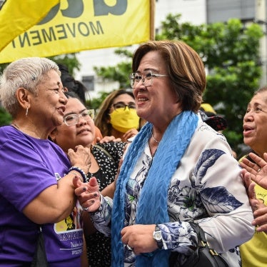 Former senator and human rights lawyer Leila de Lima (center right) acknowledges supporters after a court acquitted her of the last criminal charges against her, outside the court in Muntinlupa, Manila, Philippines, June 24, 2024. 