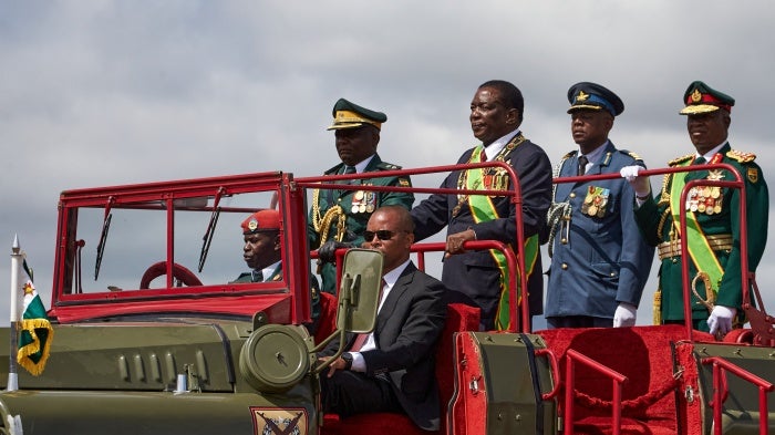 Zimbabwe President Emmerson Mnangagwa (3rd R) inspects the guard of honor at the country's 43rd Independence Day celebrations held in Mount Darwin, Mashonaland Central province, on April 18, 2023.