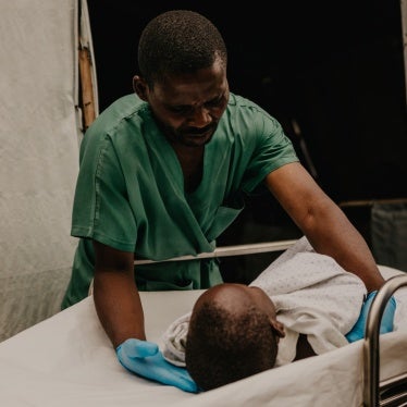 Medical staff at the ICRC-funded Ndosho hospital tend to a child injured from a 122mm rocket artillery strike on a displacement camp on the outskirts of Goma, North Kivu province, DR Congo, May 4, 2024.