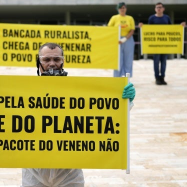 Activists protest the use of pesticides outside the National Congress in Brasilia, Brazil, on October 4, 2023. 