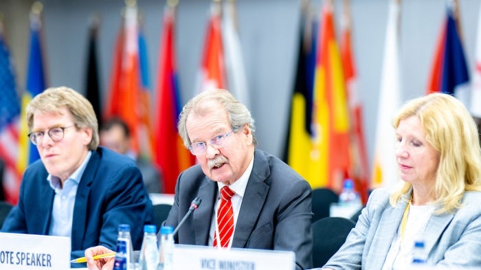 Hugh Williamson, far left, addresses the opening of the OSCE Warsaw Human Dimension Conference, 30 September 2024.