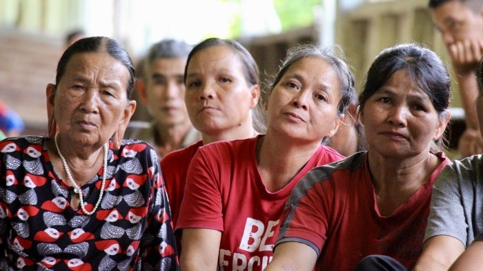 A group of women of the Kenyah Jamok community in Long Tungan village sitting