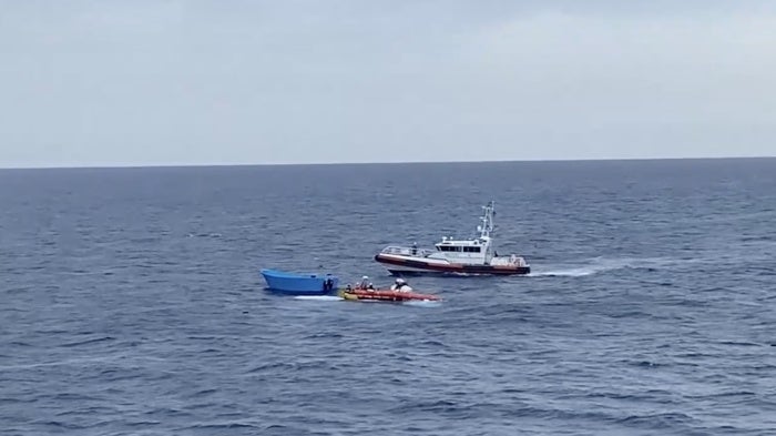 A Libyan coast guards patrol boat approaches a Médécins Sans Frontières (MSF) team performing a rescue in the central Mediterranean Sea, September 19, 2024.