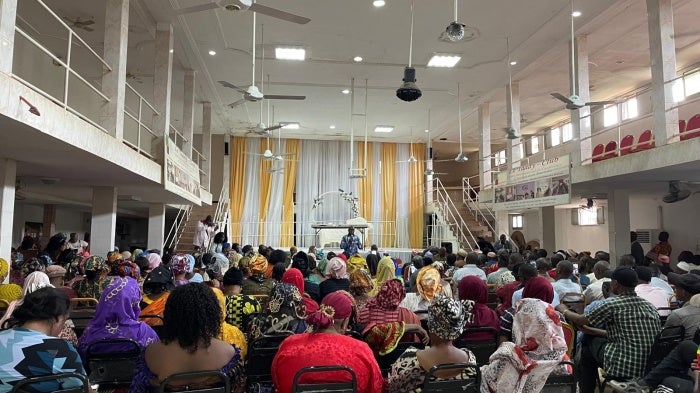 Victims of crimes committed during Guinea's 2009 stadium massacre commemorate the fifteenth anniversary of the massacre in Conakry, Guinea on September 28, 2024. A Guinean court convicted eight men of crimes against humanity in connection to the massacre in July 2024. 