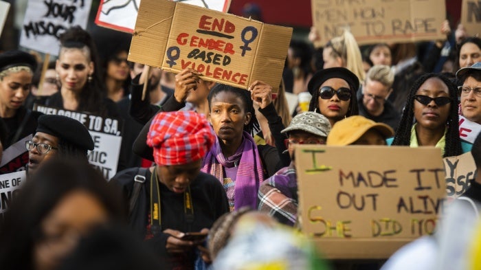 Protesters march against gender-based violence in front of the Johannesburg Stock Exchange, South Africa, September 13, 2019.