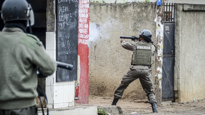 Mozambique police fire on protesters