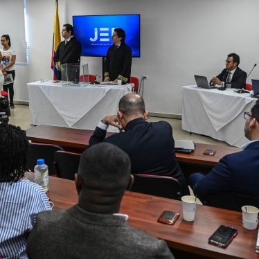 Relatives of victims of extrajudicial executions and magistrates are pictured during a hearing of the Special Jurisdiction for Peace (JEP) in Cali, Colombia on June 5, 2023.