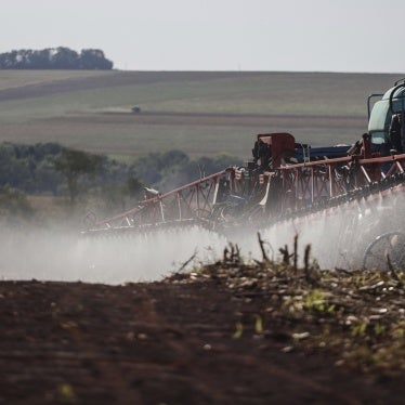 A worker applies fungicide after harvesting soybeans in Campo Mourão, in the Central-West Region of Paraná, Brazil, October 14, 2021. 