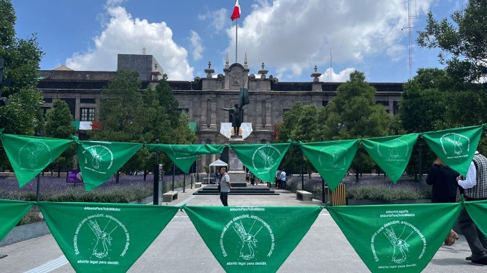 Green handkerchiefs bearing the slogan "Abortion for All of Mexico" in front of the State of Mexico Congress on September 19, 2024, in Toluca, Mexico. 