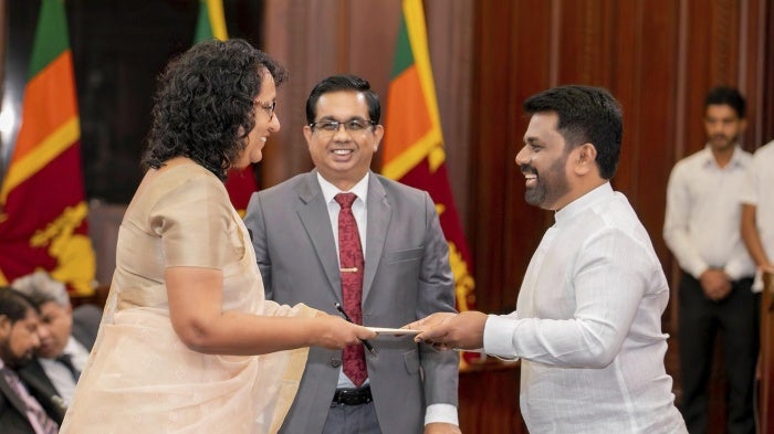 Sri Lankan President Anura Kumara Dissanayake (right) and Prime Minister Harini Amarasuriya during the swearing-in of the new cabinet members on November 18, 2024, in Colombo, Sri Lanka.