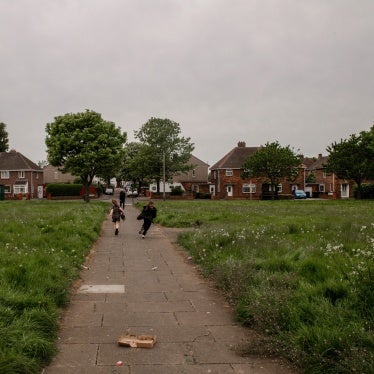 Children play in a park on a housing estate in Redcar, Teesside, May 17, 2023.