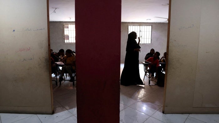 Sudanese students attend a class at a school teaching Sudanese curriculum, in Giza, Egypt, September 23, 2024. 