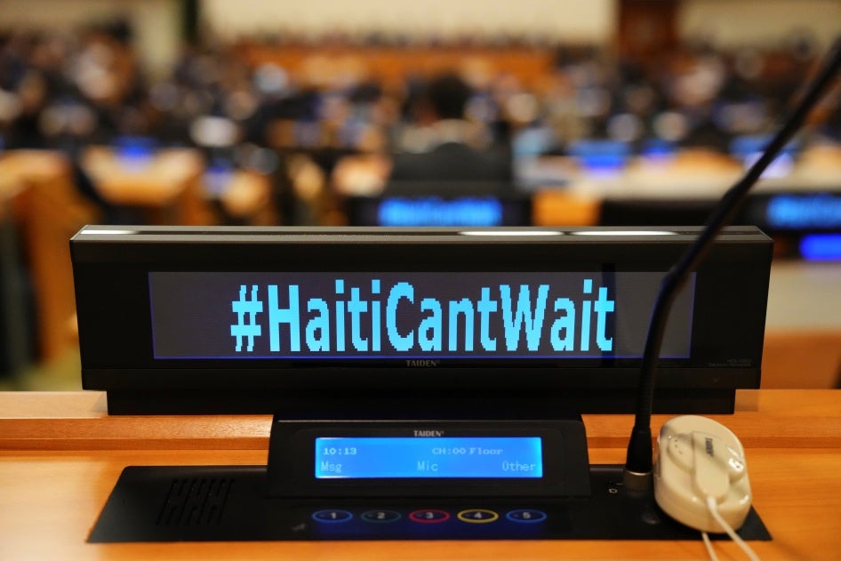 The social media slogan #HaitiCantWait is displayed as Canada Prime Minister Justin Trudeau takes part in high level meetings with an advisory group on Haiti at United Nations headquarters on September 23, 2024. 