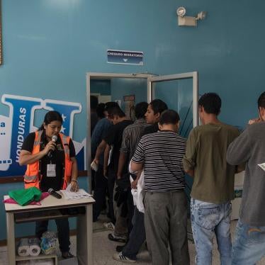 Returned migrants at the Attention Center for the Returned Migrant, San Pedro Sula airport, Honduras.